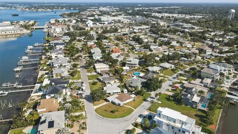 an aerial view of a house with outdoor space
