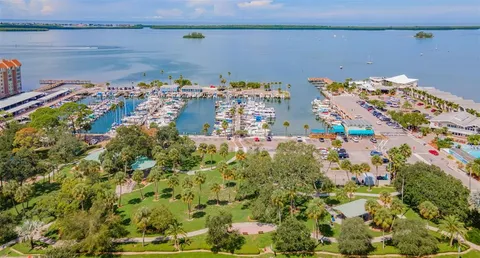a view of a street with stores