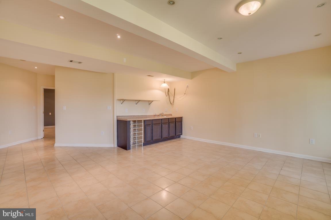 2600 Cast Off Loop Woodbridge, VA 22191 - Photo 26 of 33 Lower level family room with wetbar