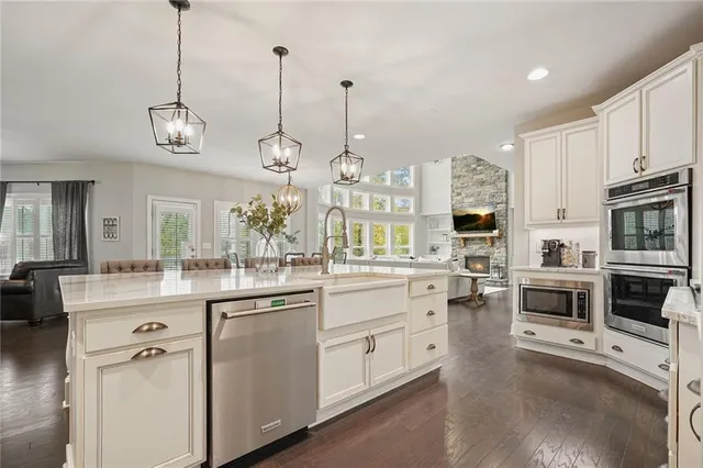 a view of living room and wooden floor