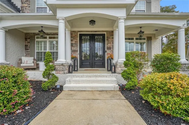 a view of a room with furniture window and wooden floor