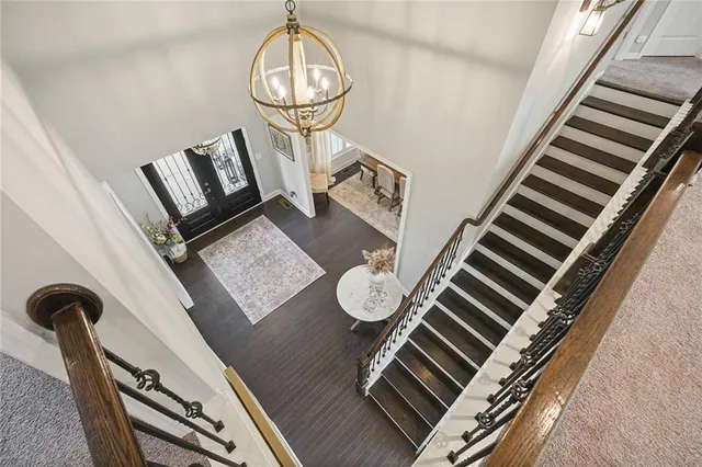 a bathroom with a sink toilet and a mirror