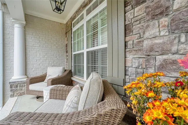a view of a livingroom with furniture and wooden floor