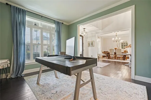 a living room with fireplace furniture and a flat screen tv