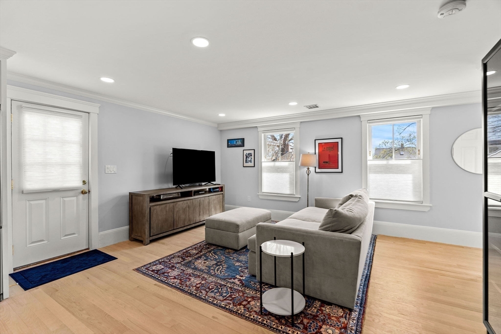 23 Union Street, Unit 2 Salem, MA 01970 - Photo 11 of 33 a living room with furniture and a flat screen tv