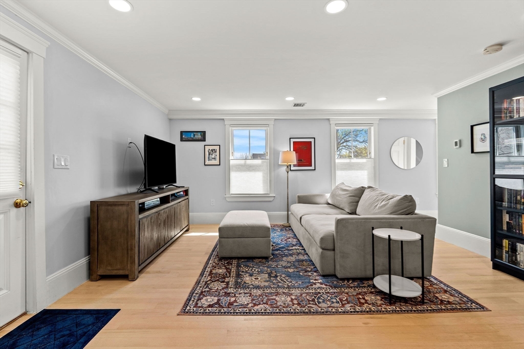 23 Union Street, Unit 2 Salem, MA 01970 - Photo 12 of 33 a living room with furniture and a flat screen tv