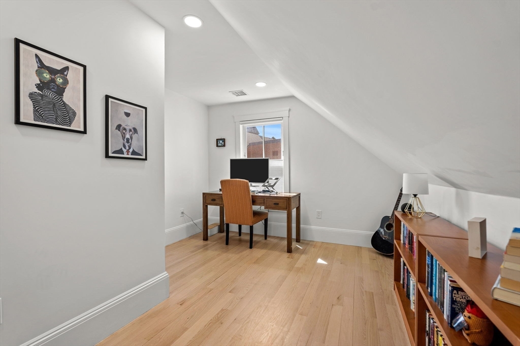 23 Union Street, Unit 2 Salem, MA 01970 - Photo 21 of 33 a view of a room with furniture and wooden floor