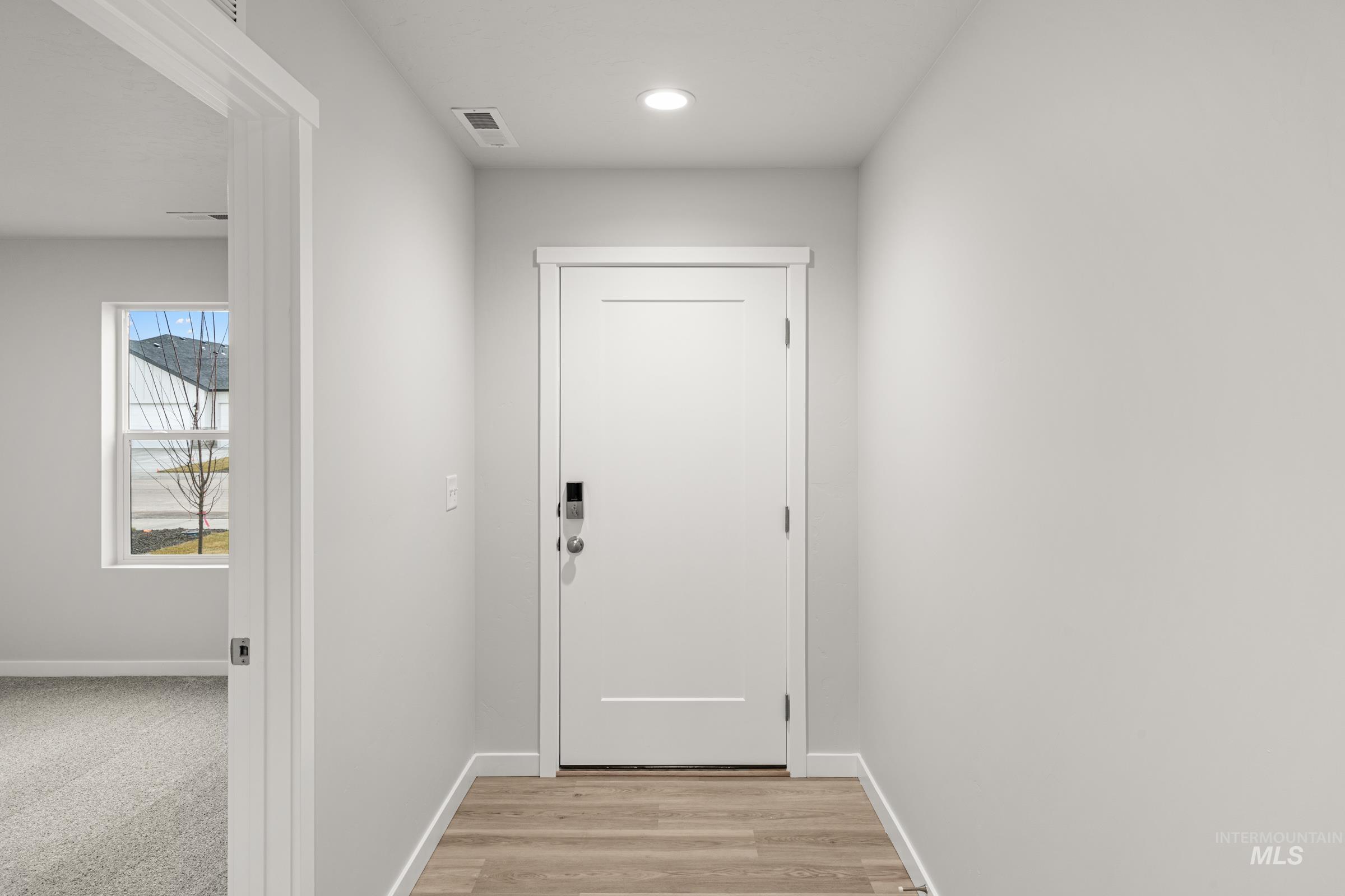 13693 Redway Court Caldwell, ID 83607 - Photo 2 of 25 Doorway with wood finished floors and recessed lighting