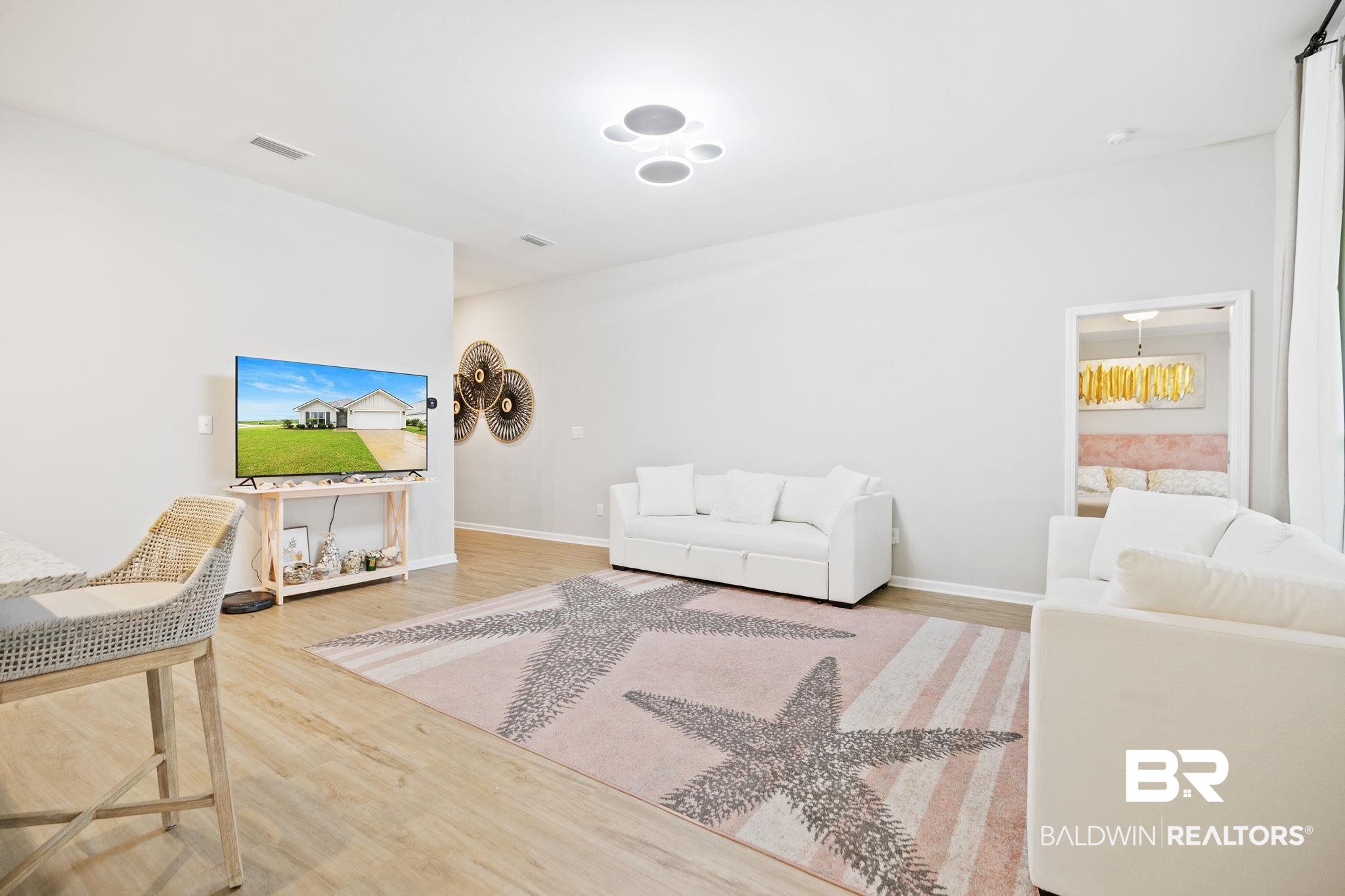 1271 Caper Avenue Foley, AL 36535 - Photo 9 of 29 Living room featuring wood-type flooring