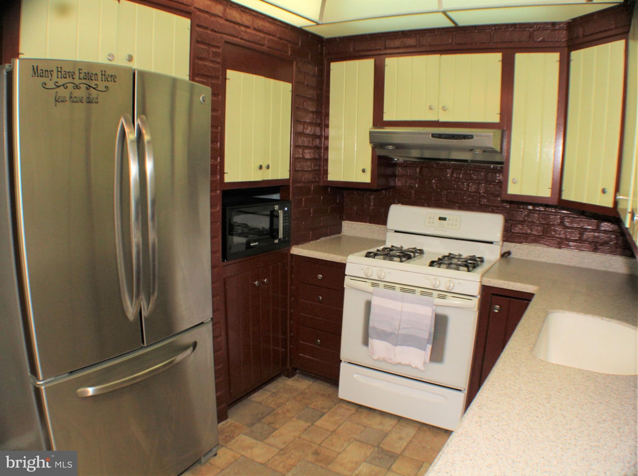 533 Elford Road Fairless Hills, PA 19030 - Photo 9 of 37 Kitchen with corian counters gas range