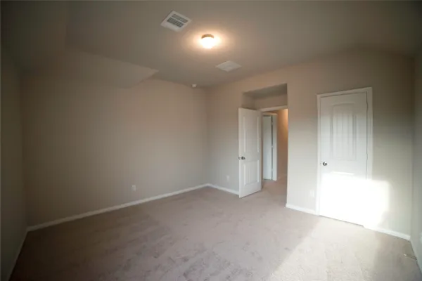 an empty room with an entryway
