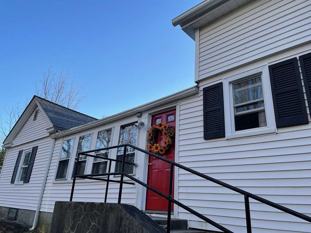 8 Pike Street Hopkinton, MA 01748 - Photo 2 of 34 a view of a house with a street