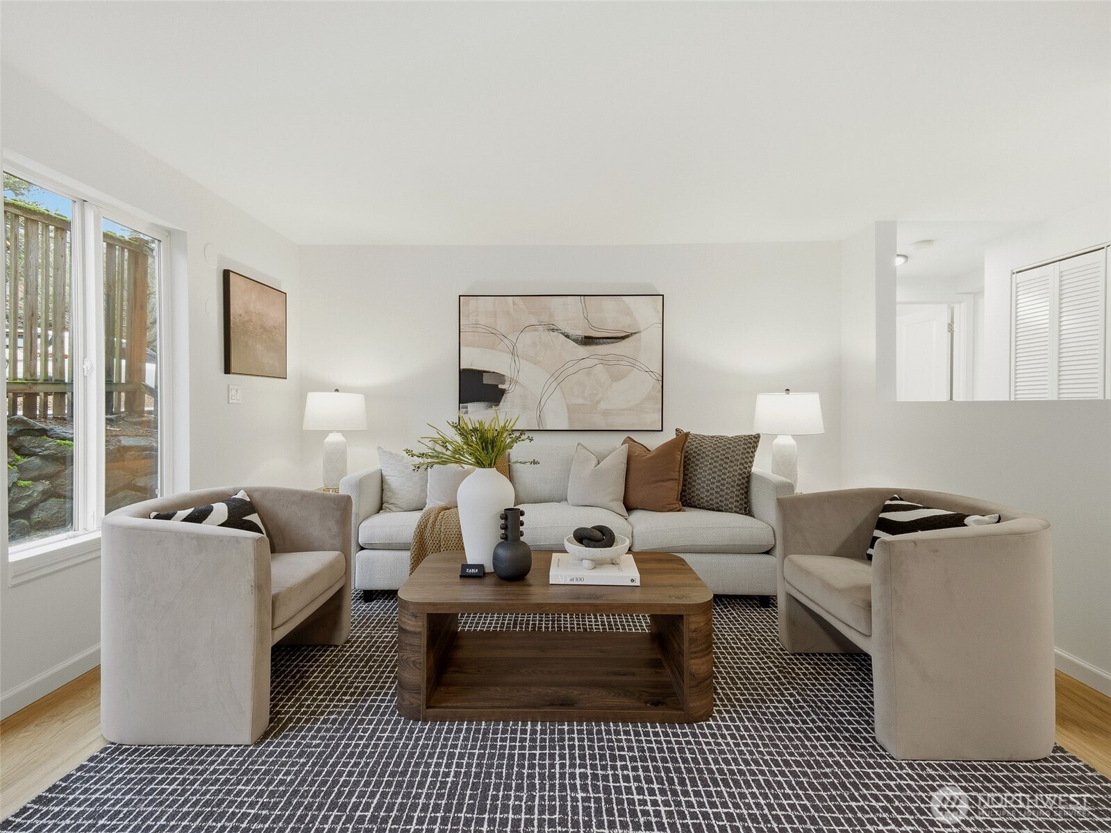 3661 Phinney Avenue North, Unit 107 Seattle, WA 98103 - Photo 2 of 29 a living room with furniture