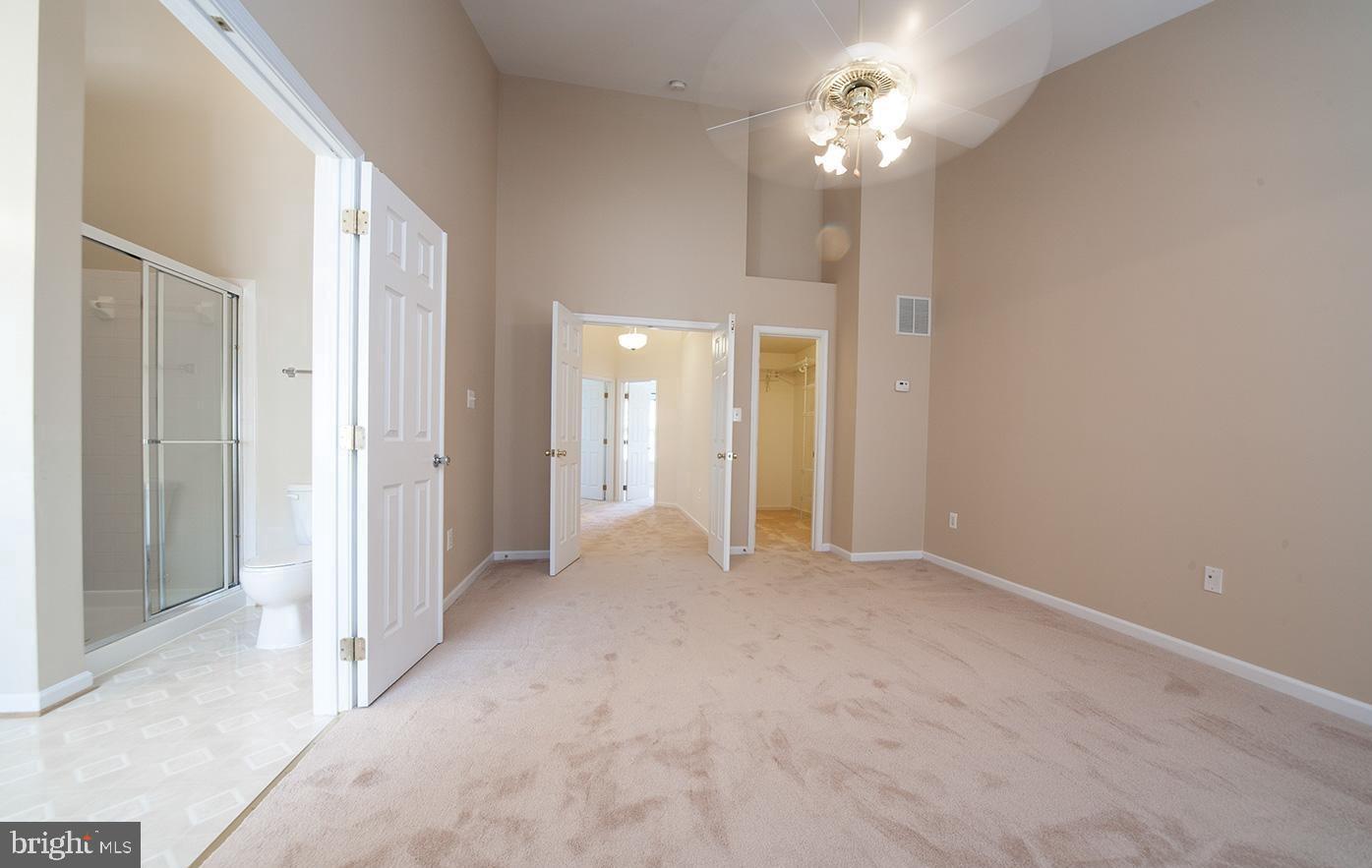 6727 Sullivan Way Alexandria, VA 22315 - Photo 12 of 24 a view of a chandelier fan and closet area