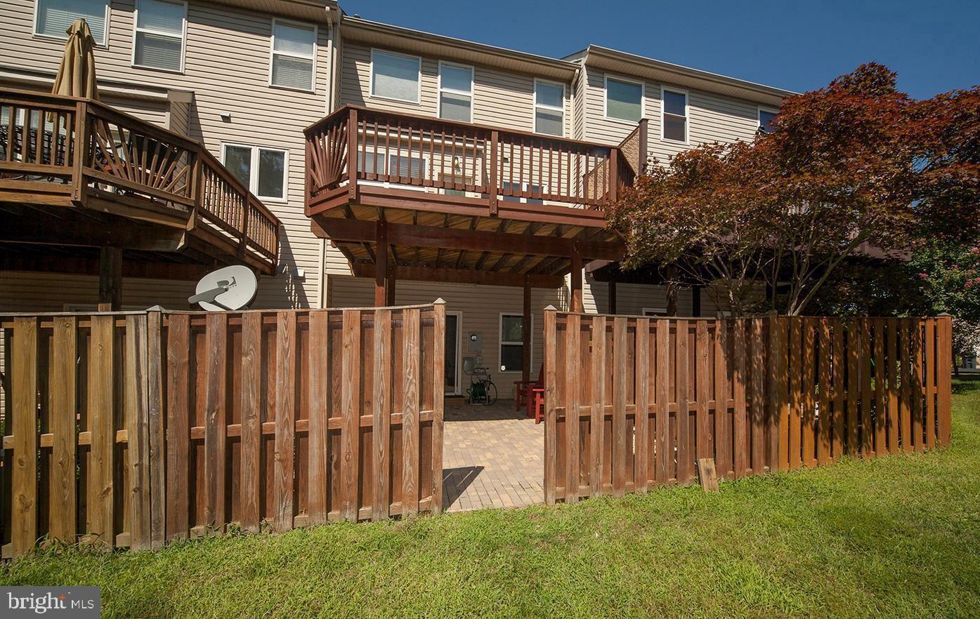 6727 Sullivan Way Alexandria, VA 22315 - Photo 23 of 24 a view of a house with a backyard