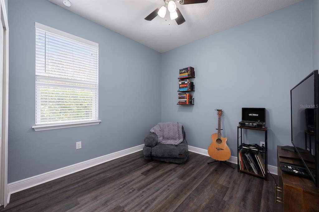 1398 Riley Circle Deland, FL 32724 - Photo 11 of 29 a bedroom with furniture and a window