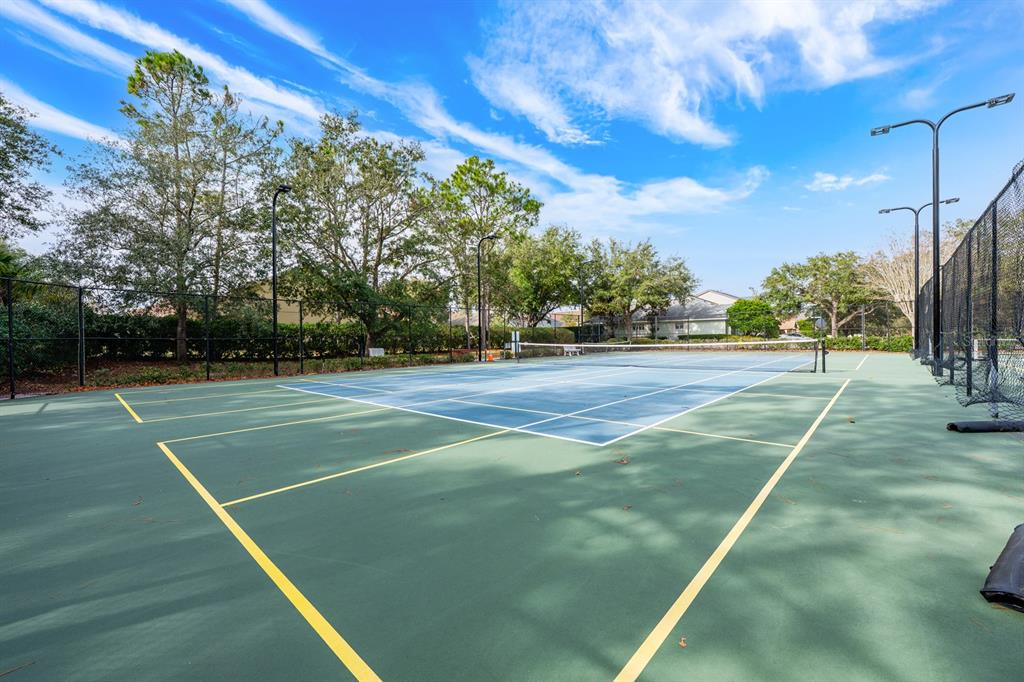 1398 Riley Circle Deland, FL 32724 - Photo 25 of 29 a view of an outdoor space and tennis court