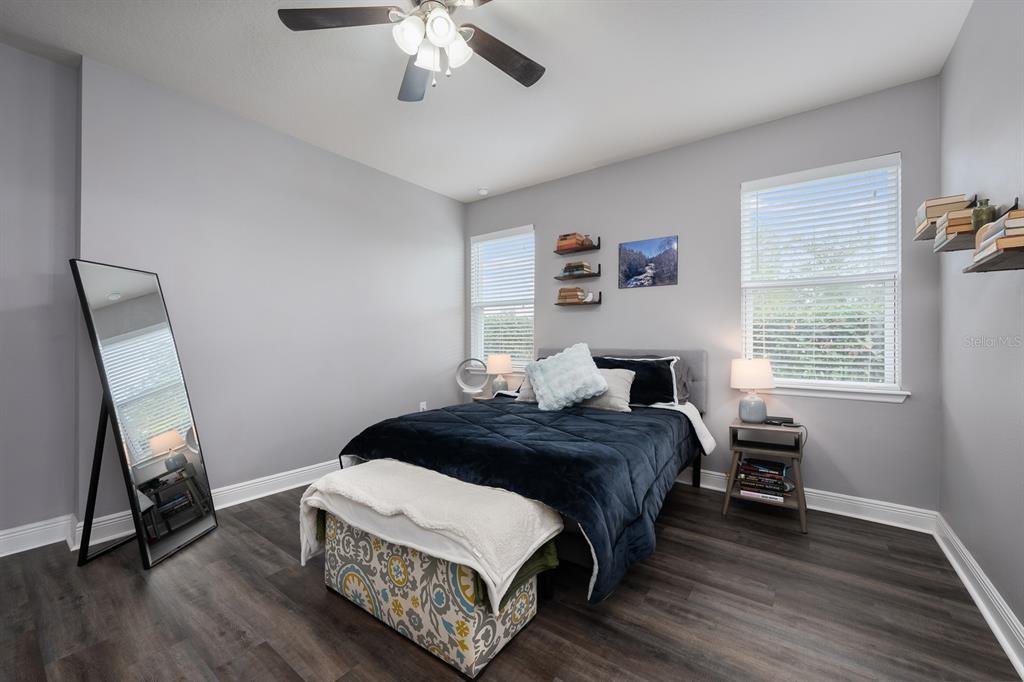 1398 Riley Circle Deland, FL 32724 - Photo 9 of 29 a bedroom with a bed and a window