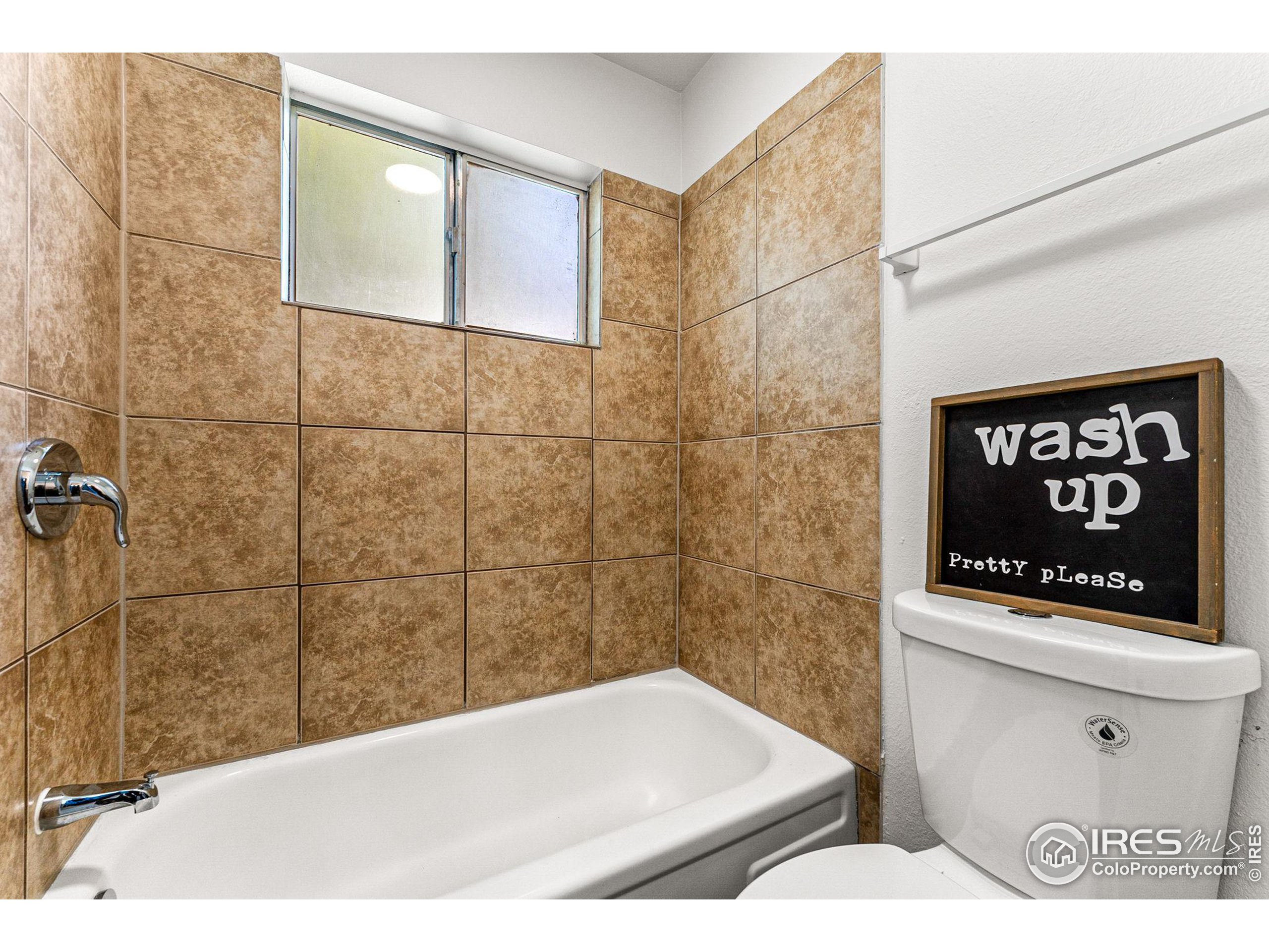 2408 Orchard Place Fort Collins, CO 80521 - Photo 19 of 36 a bathroom with a shower and a sink