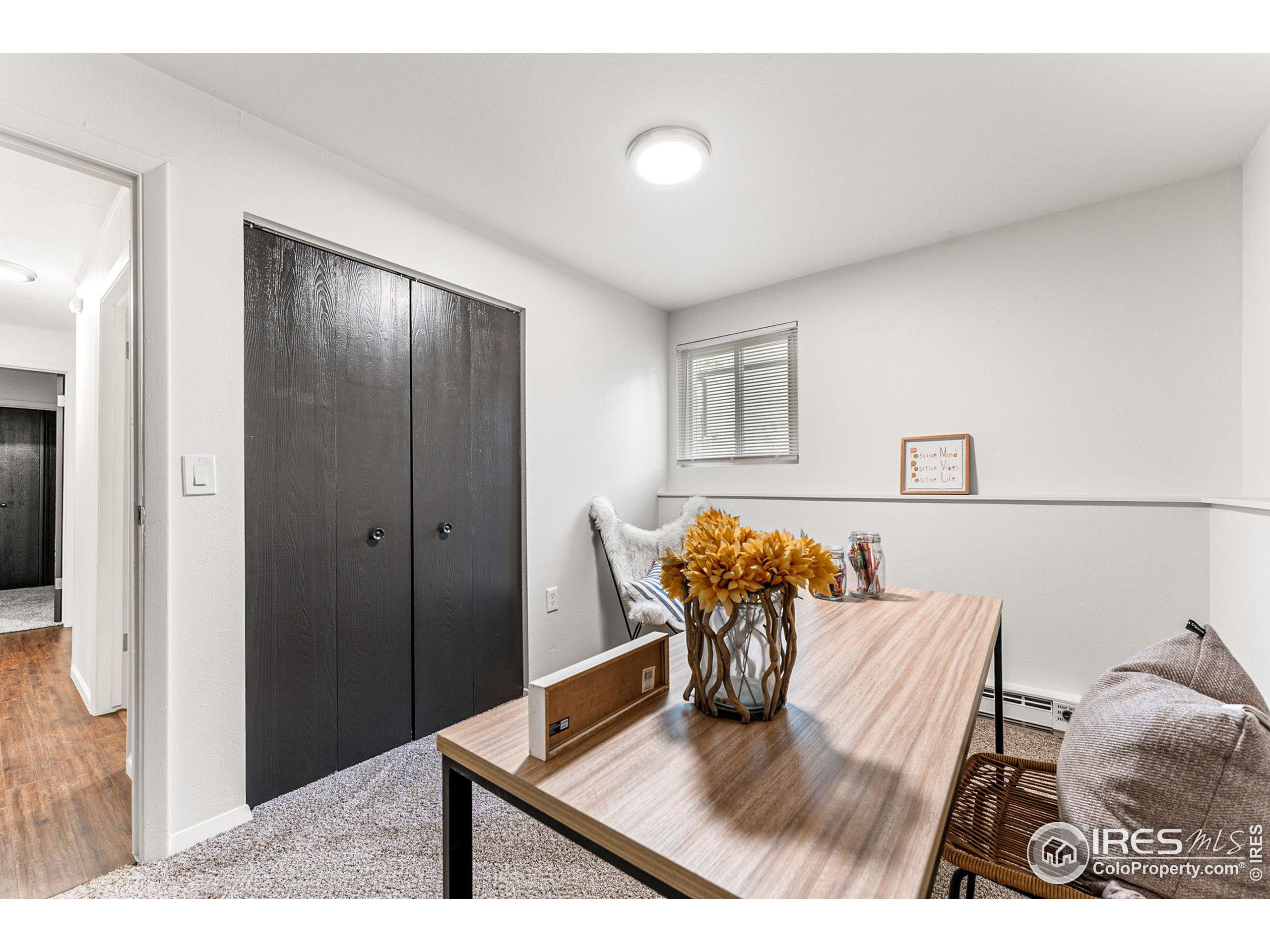 2408 Orchard Place Fort Collins, CO 80521 - Photo 24 of 36 a view of a dining room with furniture