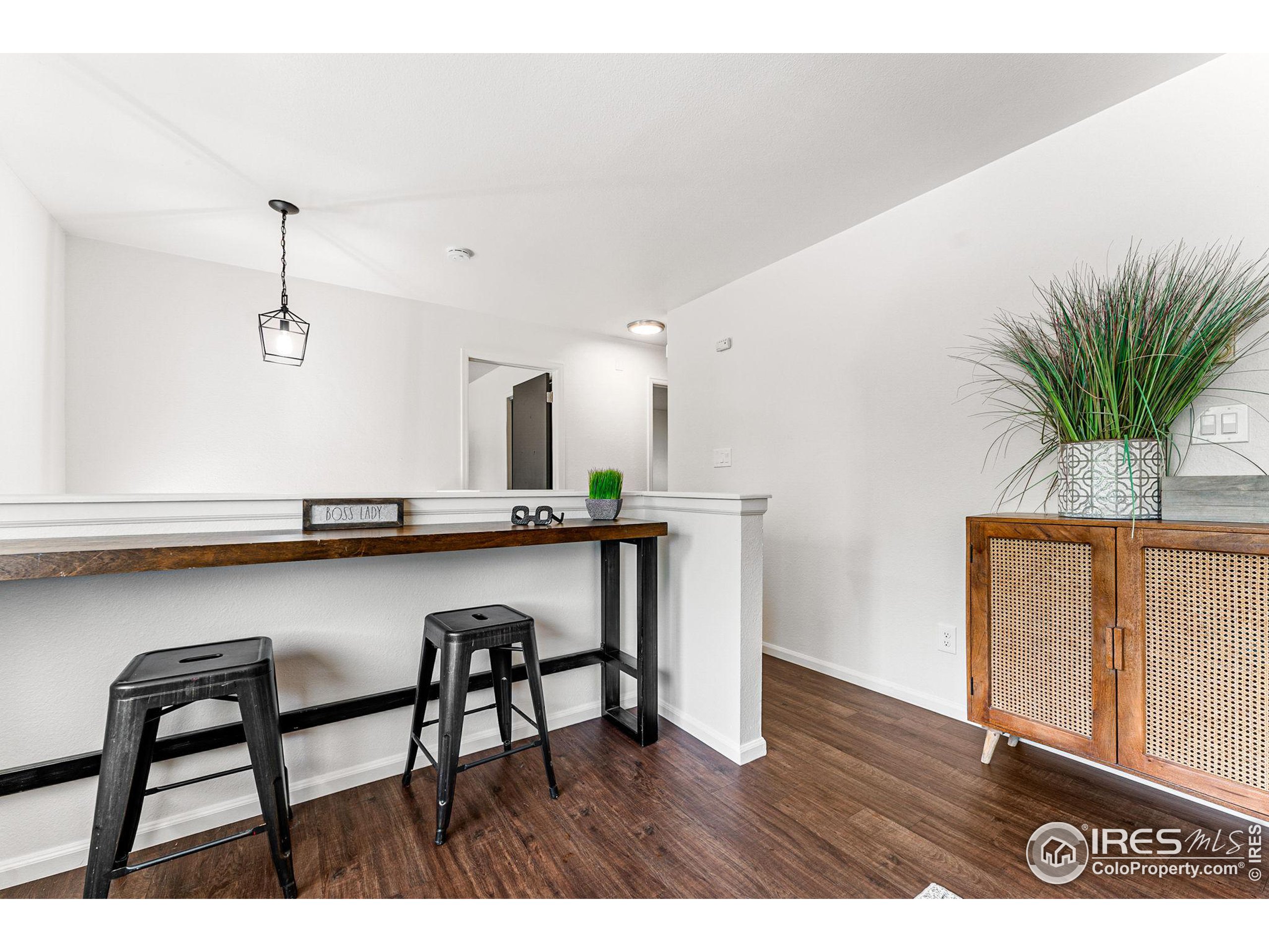 2408 Orchard Place Fort Collins, CO 80521 - Photo 7 of 36 a kitchen with a table and chairs