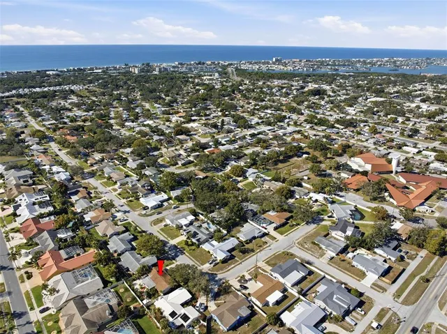an aerial view of residential building with parking space