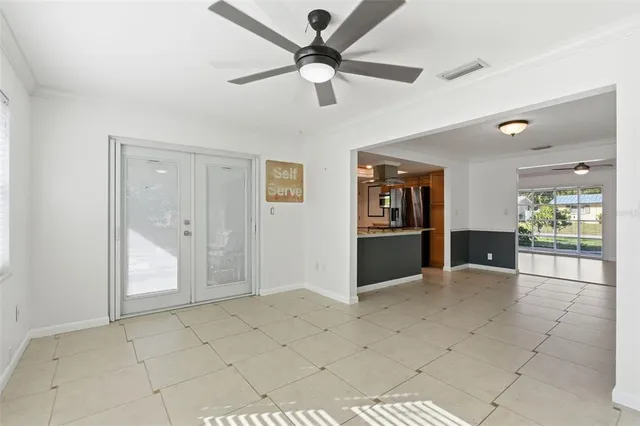 a view of an empty room and window