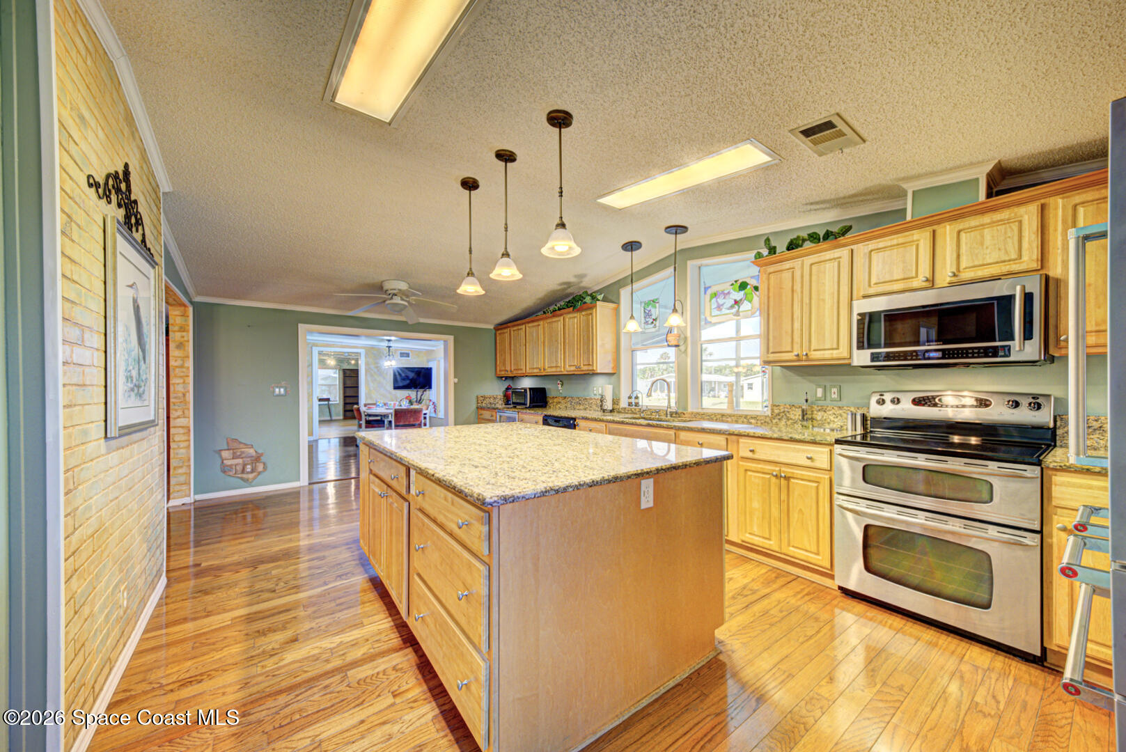 176 Woodsmill Boulevard, Unit 177 Cocoa, FL 32926 - Photo 10 of 63 8 kitchen with island