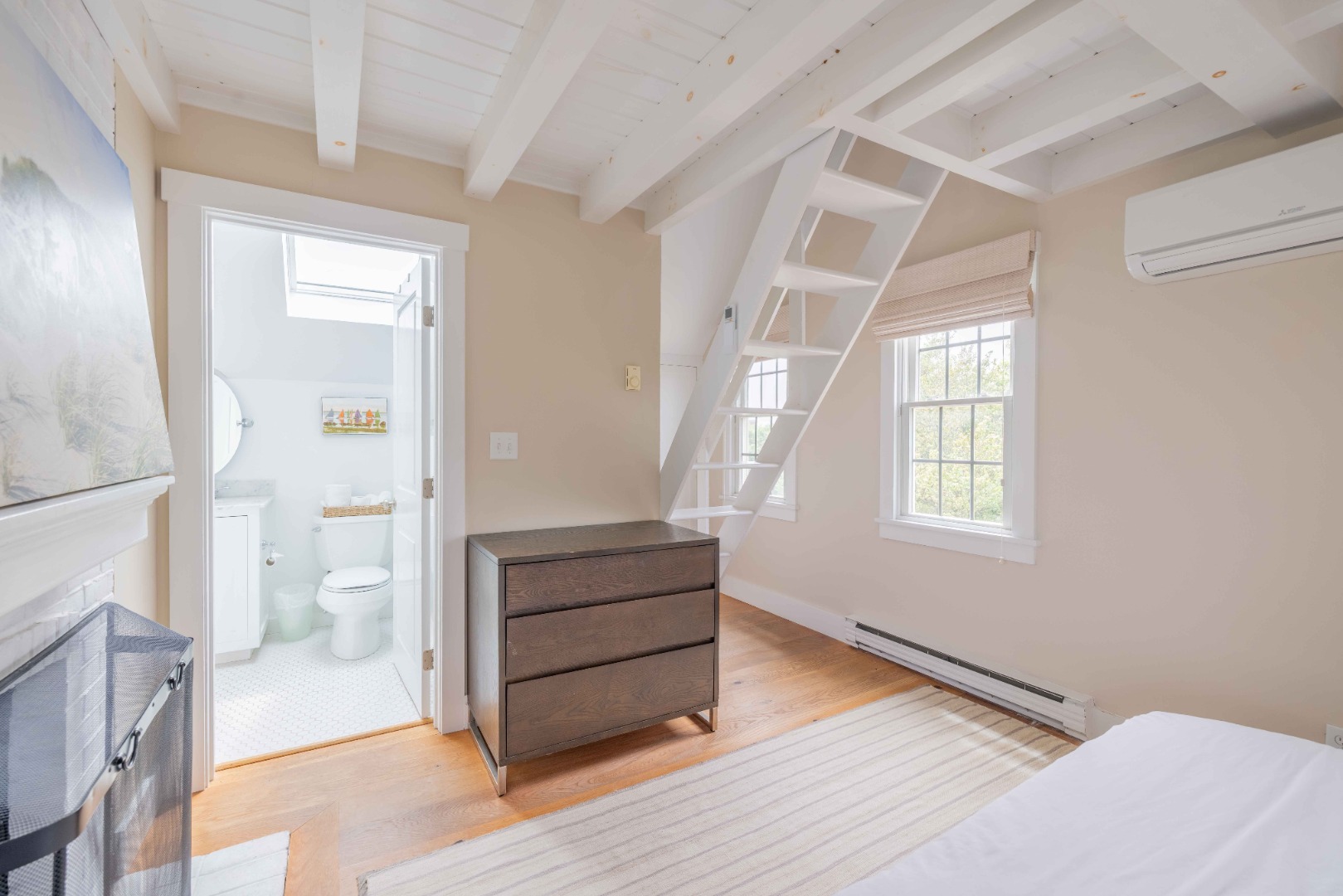 76 Sankaty Road Nantucket, MA 02554 - Photo 19 of 24 Primary bathroom and open stairs to the loft