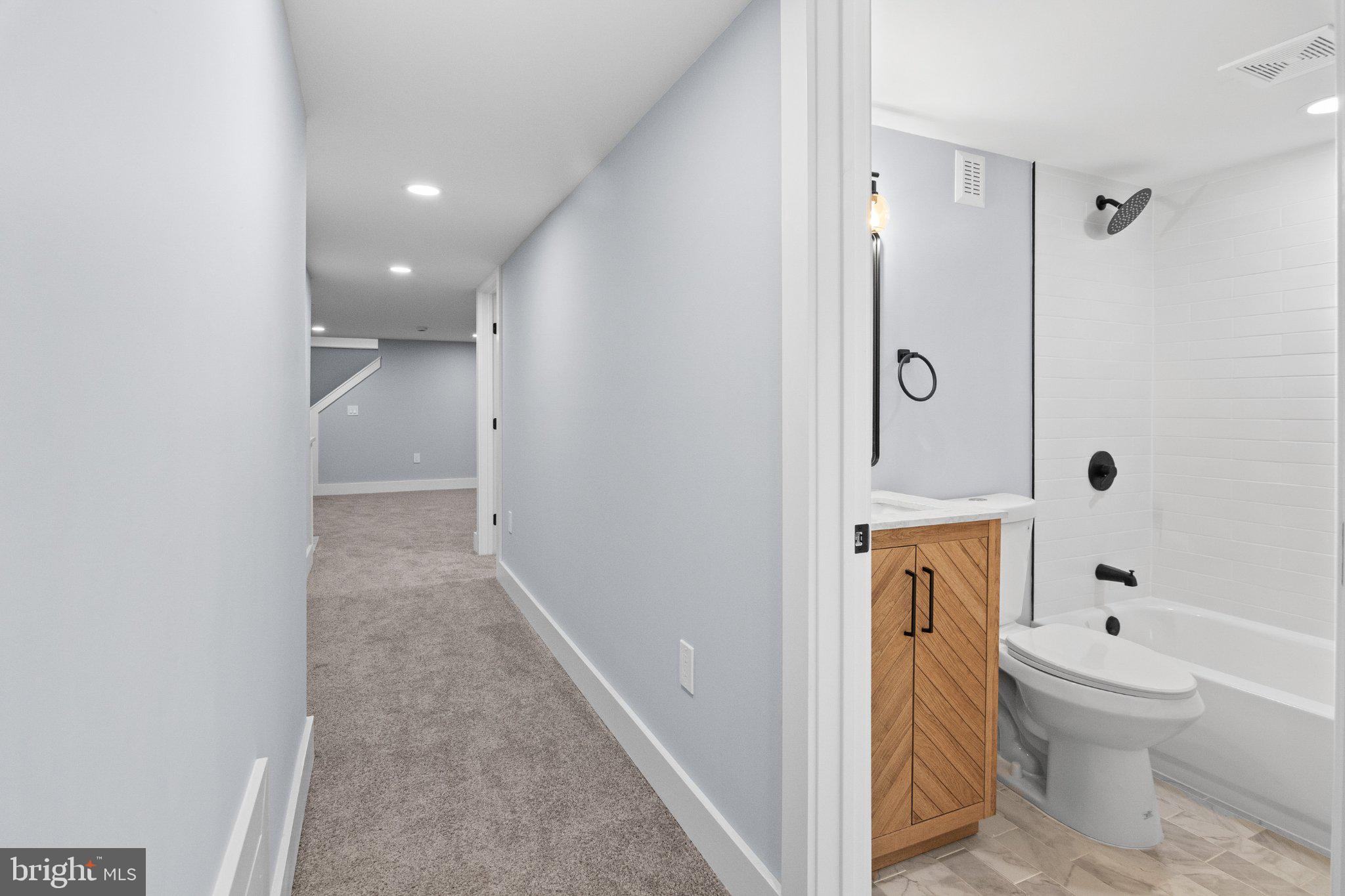 14200 Dav Road Rockville, MD 20850 - Photo 60 of 60 Modern hallway with stylish bath.