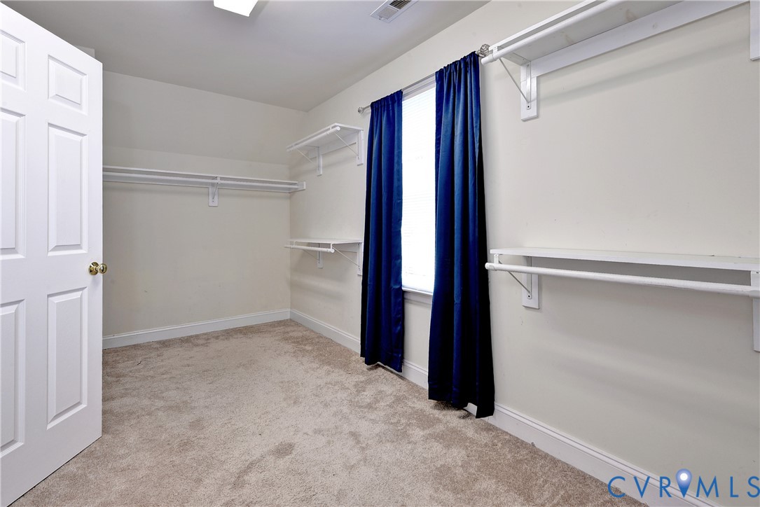 11385 Winding River Road Providence Forge, VA 23140 - Photo 28 of 43 an empty room with windows