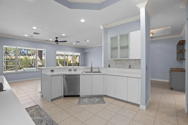 a bathroom with a sink vanity and a mirror