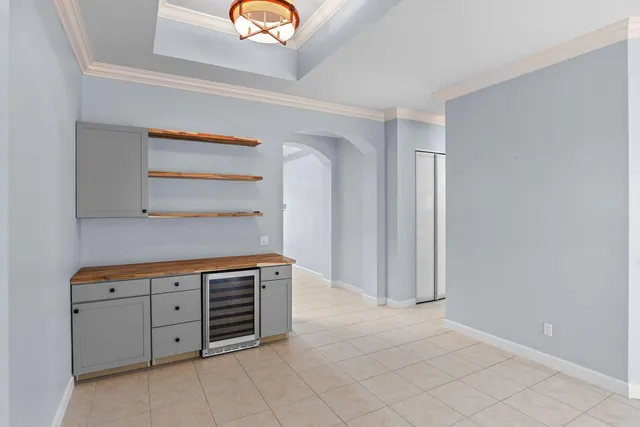 a utility room with sink dryer and washer