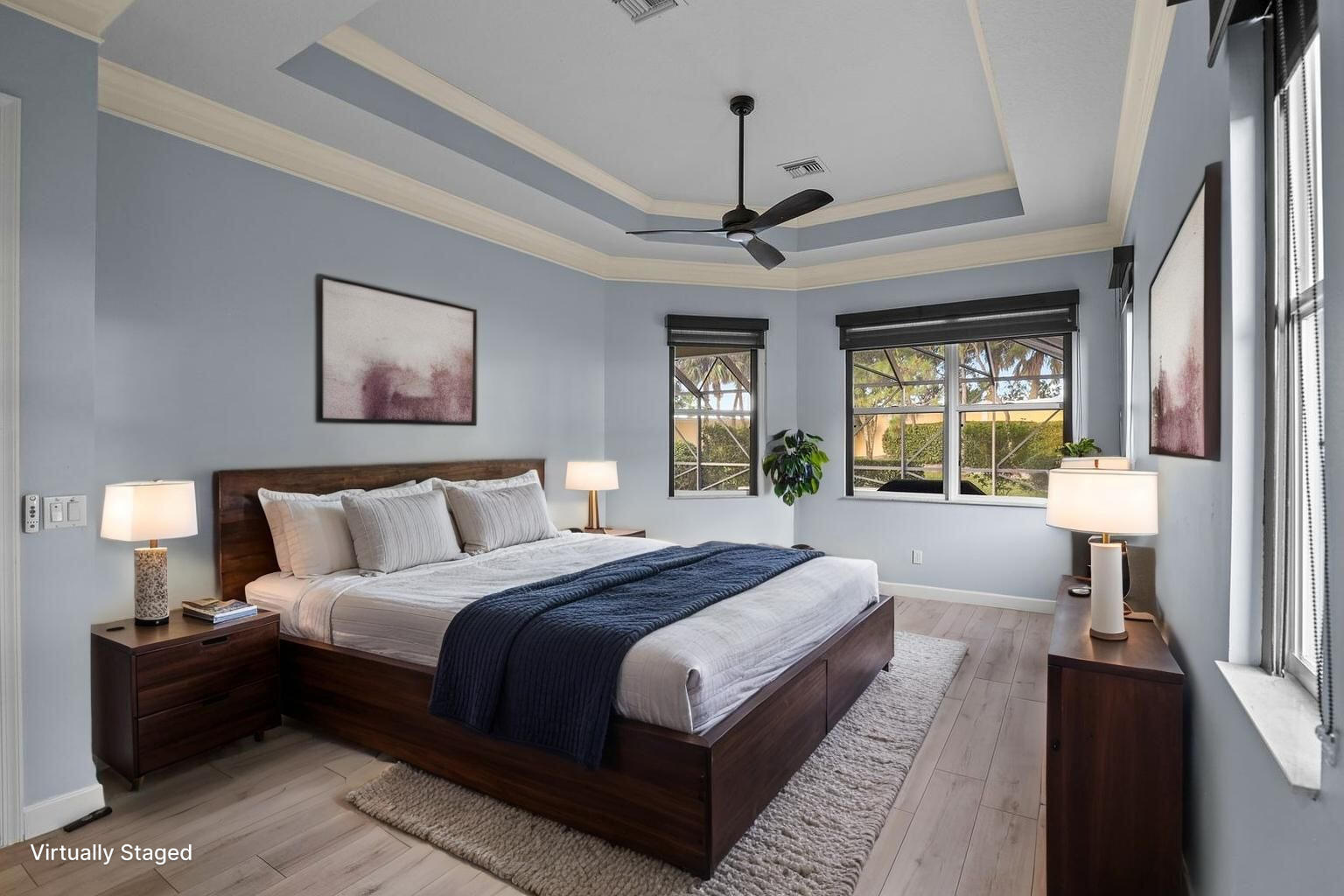 9152 Short Chip Circle Port St. Lucie, FL 34986 - Photo 20 of 72 a spacious bedroom with a large bed and a window