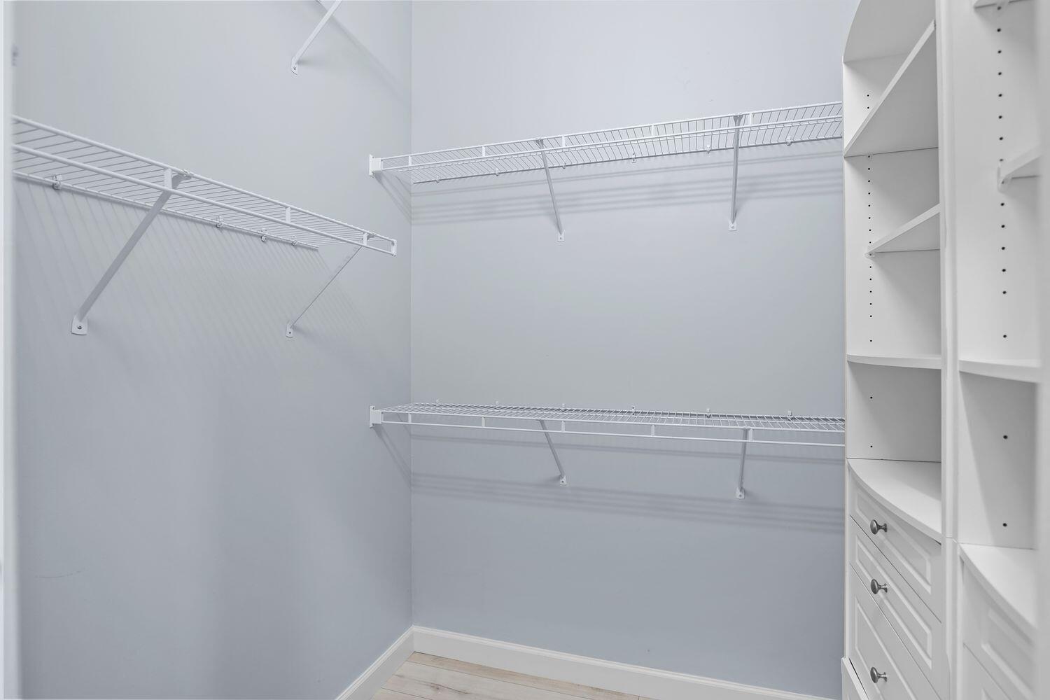 9152 Short Chip Circle Port St. Lucie, FL 34986 - Photo 22 of 72 a view of a store room with racks on the wall