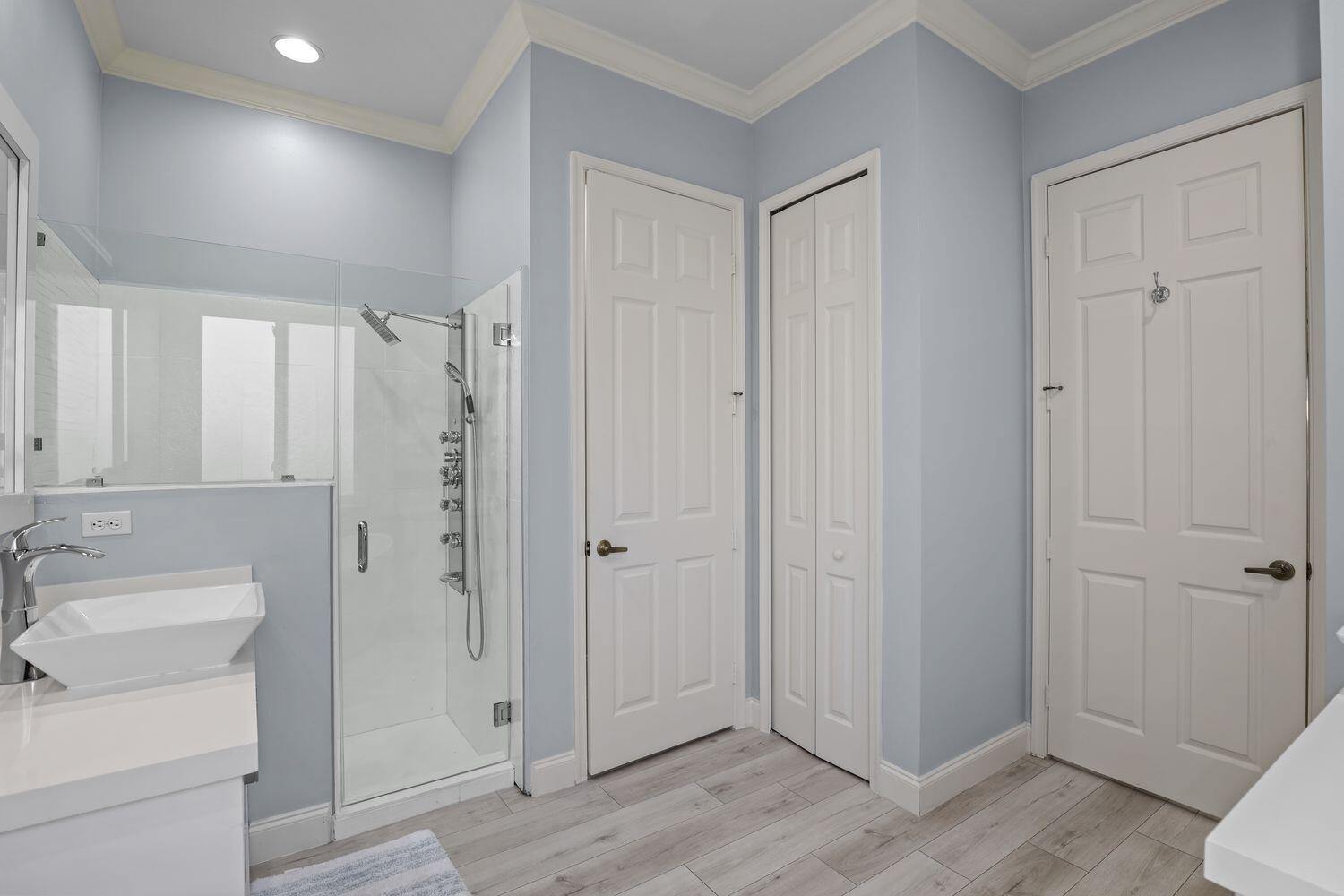 9152 Short Chip Circle Port St. Lucie, FL 34986 - Photo 23 of 72 a bathroom with a sink a toilet and shower