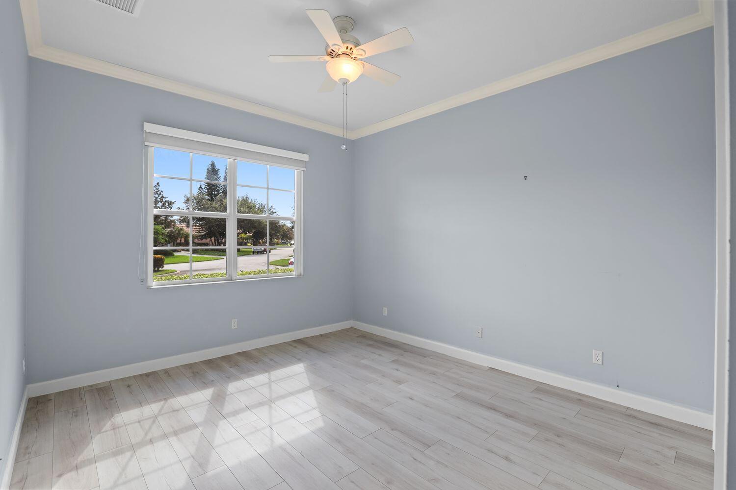 9152 Short Chip Circle Port St. Lucie, FL 34986 - Photo 28 of 72 a view of an empty room with a window