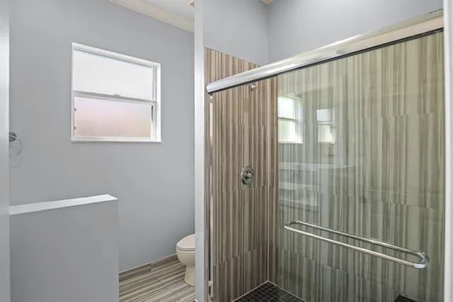 an aerial view of a house with a garden