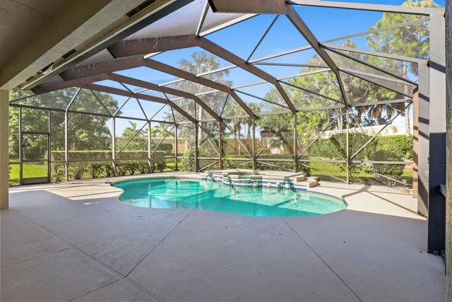 a view of a patio with a yard