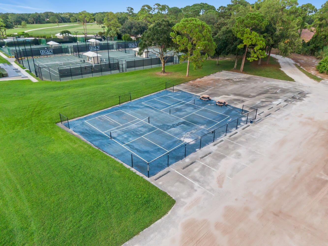 9152 Short Chip Circle Port St. Lucie, FL 34986 - Photo 70 of 72 a view of a backyard with a garden