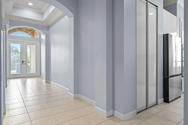 a kitchen with stainless steel appliances a refrigerator and a sink