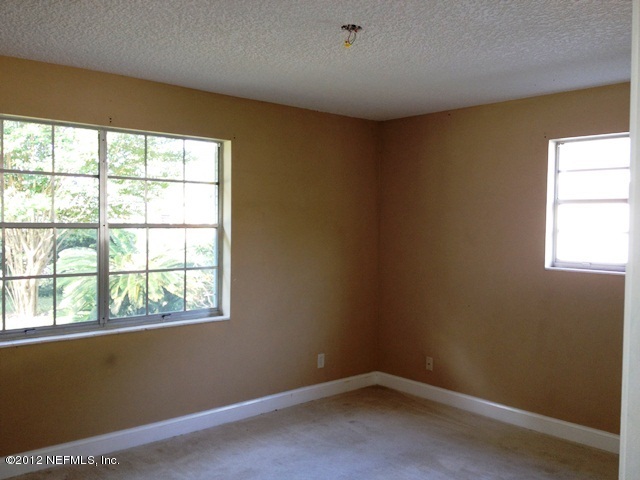 5633 Hickson Road Jacksonville, FL 32207 - Photo 6 of 13 MASTER BEDROOM