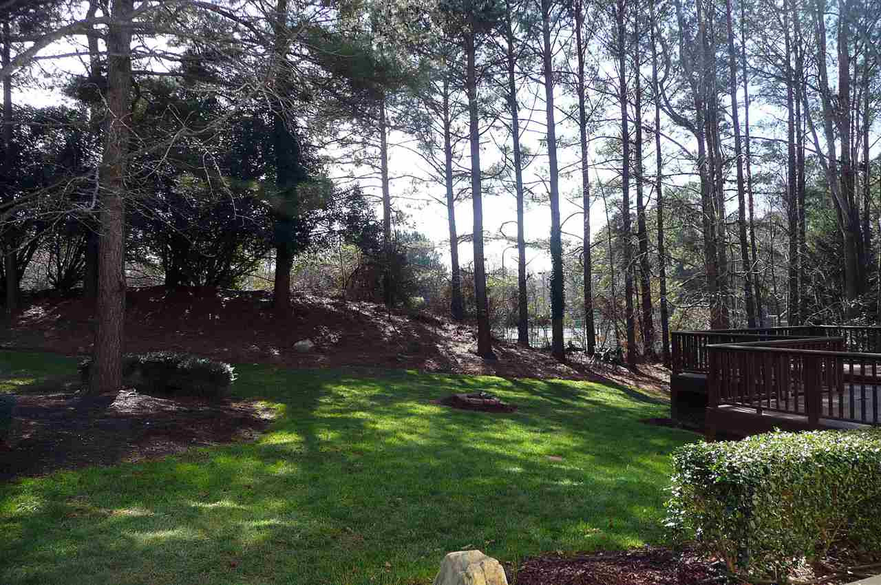4905 Gable Ridge Lane Holly Springs, NC 27540 - Photo 19 of 25 This nicely landscaped lot will soon be filled with color as the trees and bushes come alive with spring blooms. Backyard View