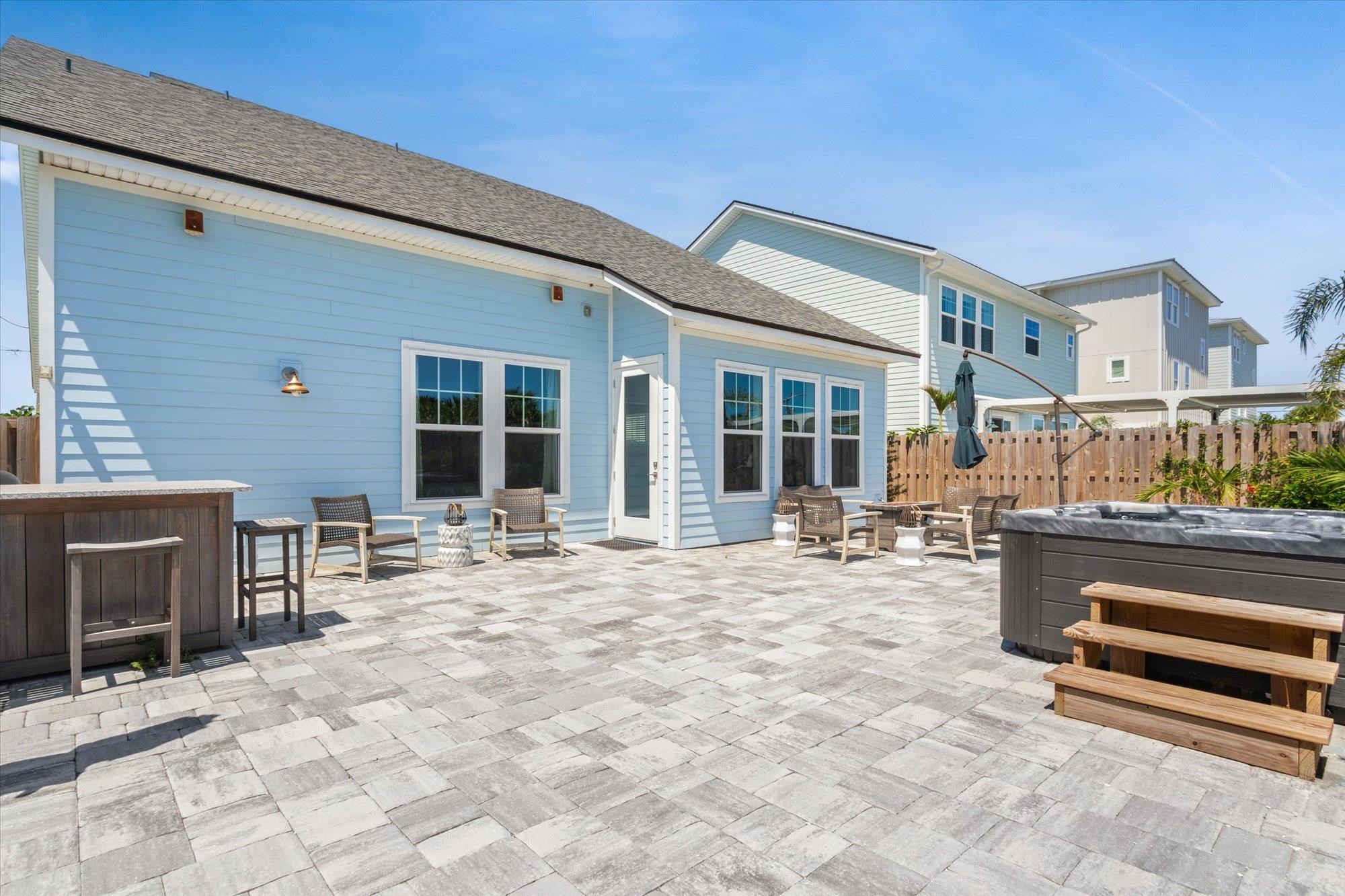 125 5th Street St. Augustine, FL 32080 - Photo 14 of 51 a view of a dinning table and chairs in the patio