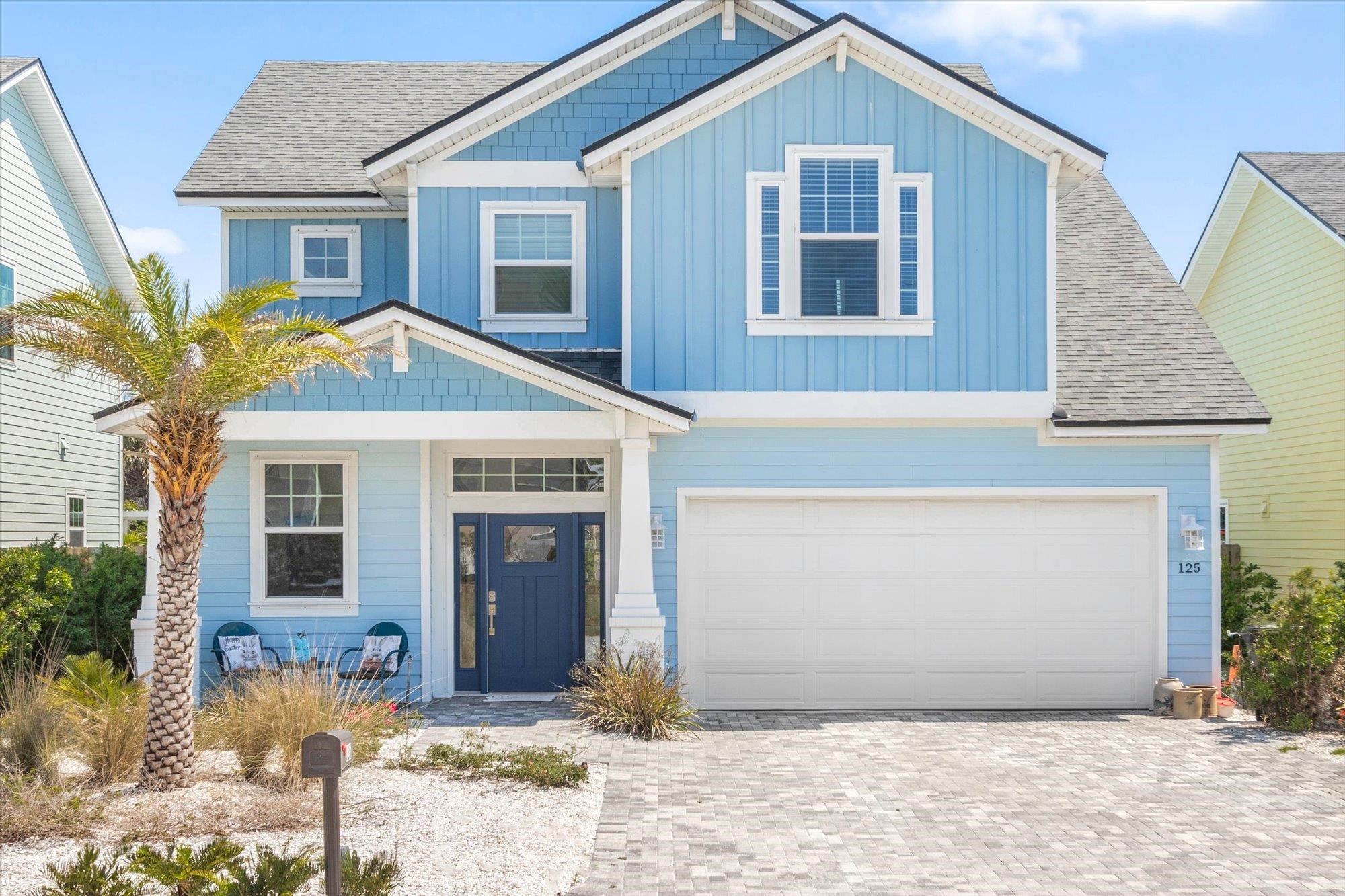 125 5th Street St. Augustine, FL 32080 - Photo 2 of 51 a front view of a house with garden