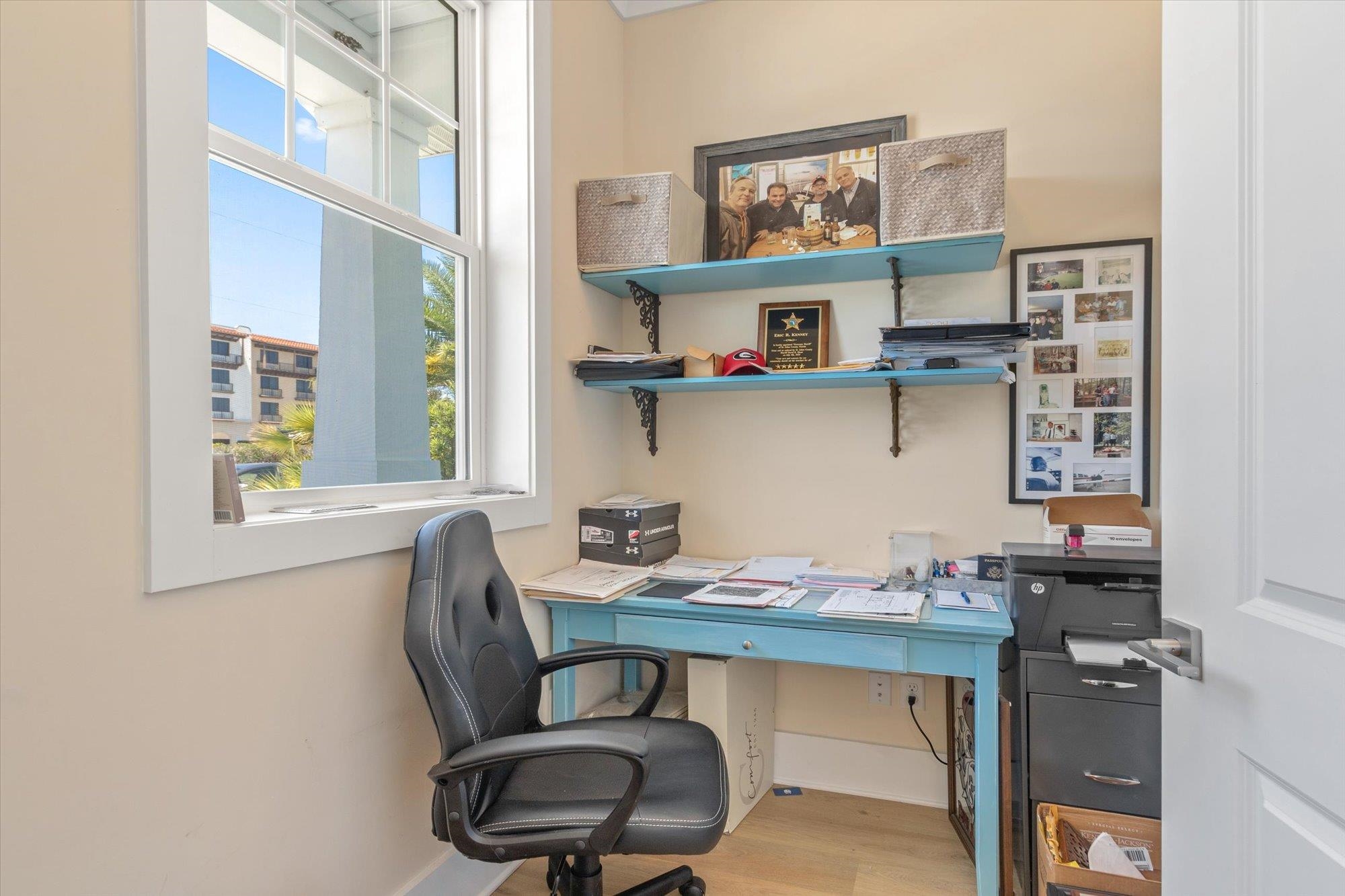 125 5th Street St. Augustine, FL 32080 - Photo 24 of 51 a view of a workspace with furniture and a window