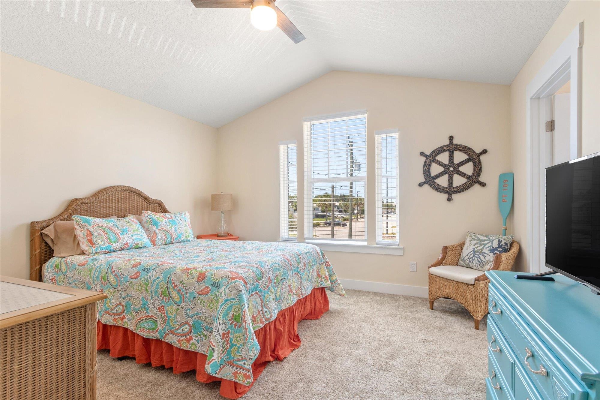 125 5th Street St. Augustine, FL 32080 - Photo 35 of 51 a bedroom with a bed and a window