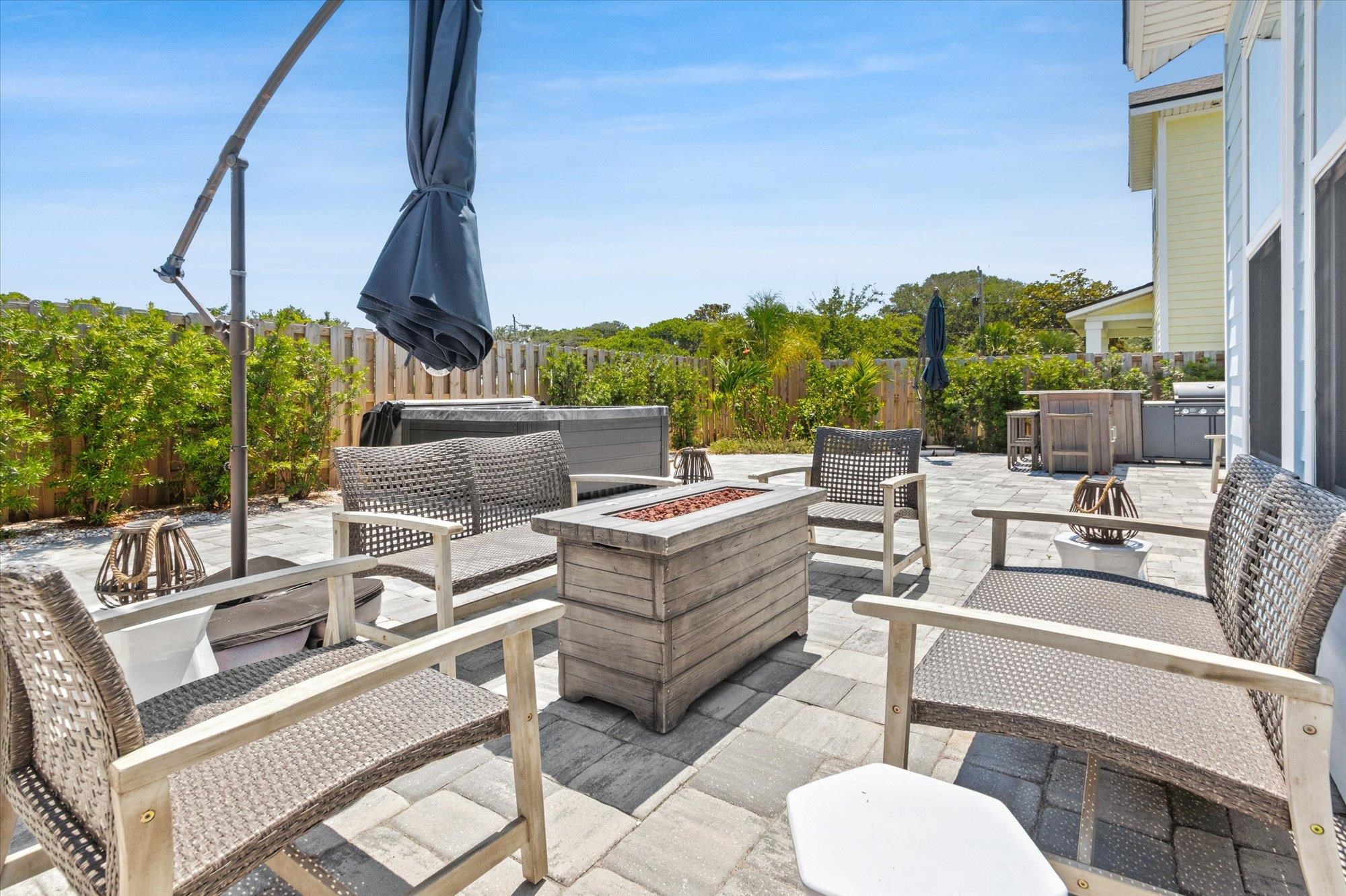 125 5th Street St. Augustine, FL 32080 - Photo 4 of 51 a view of a patio with couches chairs and potted plants