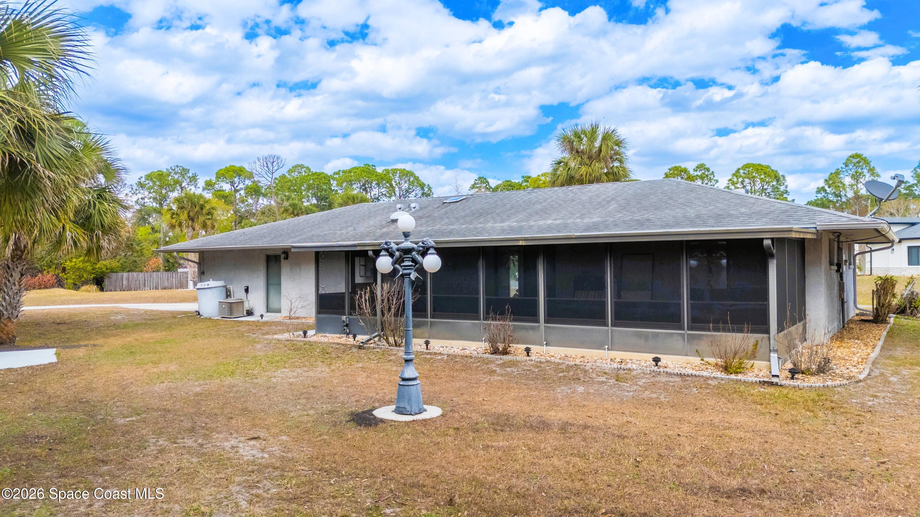 1782 Sand Road Southeast Palm Bay, FL 32909 - Photo 29 of 56 DJI_20260227021601_0265_D_GRACE5K