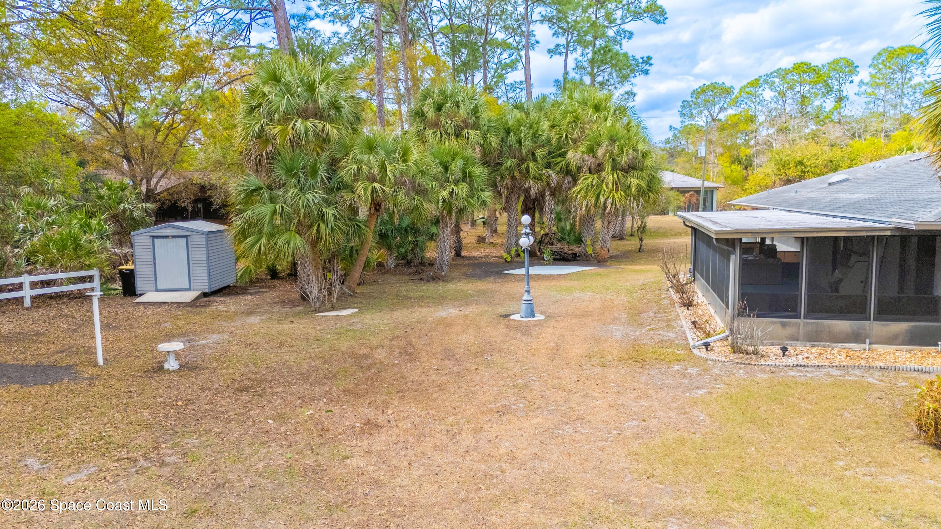 1782 Sand Road Southeast Palm Bay, FL 32909 - Photo 32 of 56 DJI_20260227021533_0263_D_GRACE5K